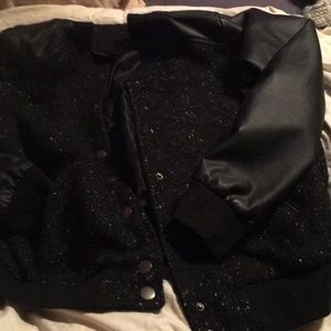 Faux leather sleeve jacket, has pockets